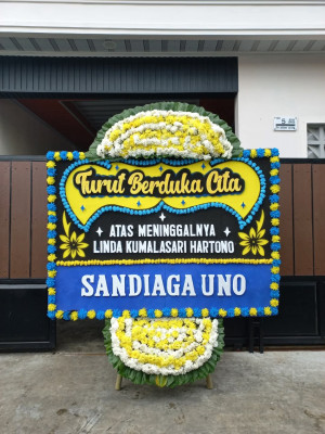 Papan Bunga Duka di Taman Bunga